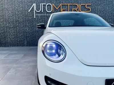 Volkswagen New Beetle 2012 - 10900 EUR, 229000 km - AUTO.MOTO.pt - 229000km - foto 4 de 14