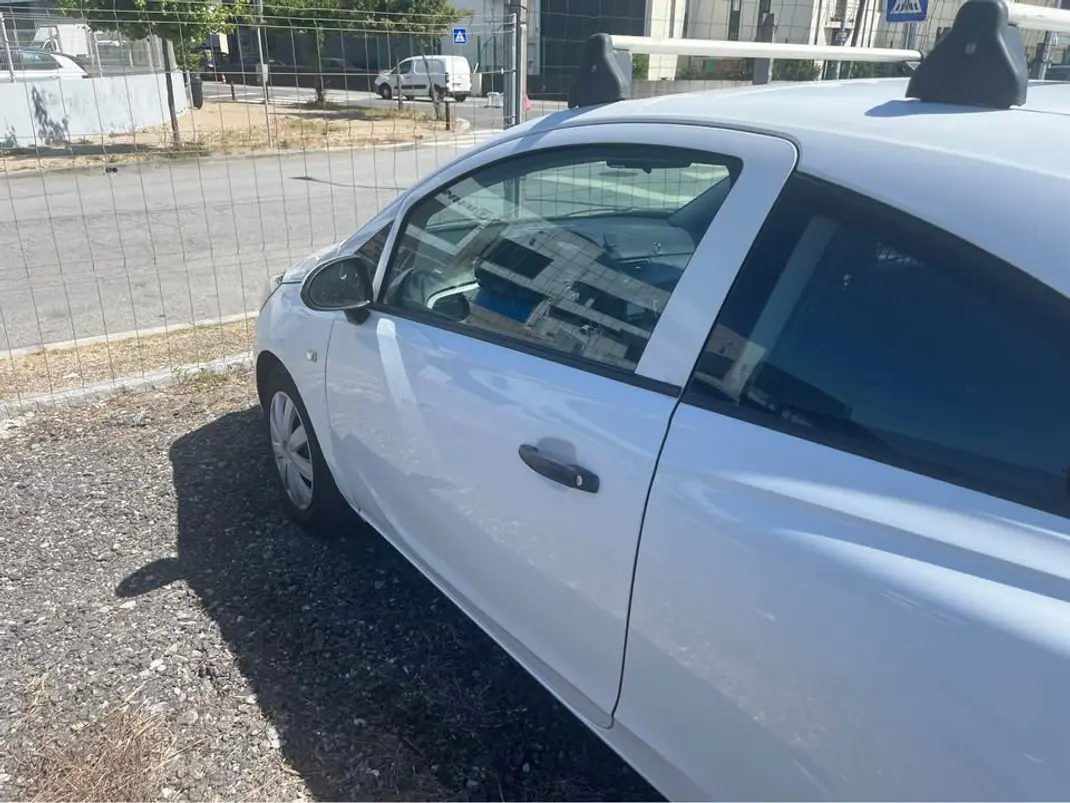 Opel Corsa E Van 2017 - 4650 EUR, 225590 km - AUTO.MOTO.pt - 225590km - foto 14 de 15