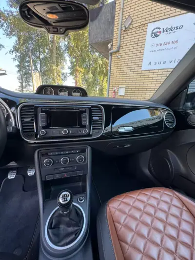 Volkswagen New Beetle Cabriolet 2014 - 27500 EUR, 99600 km - 99600km - foto 7 de 11
