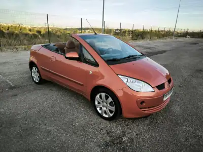Mitsubishi Colt 2007 - 8950 EUR, 22671 km - AUTO.MOTO.pt - 22671km - foto 11 de 56