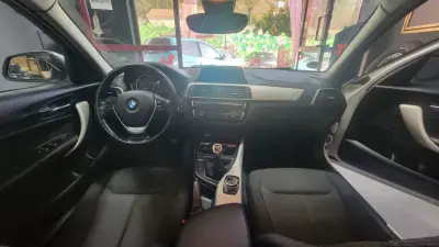 BMW 118 2018 - 22490 EUR, 92000 km - AUTO.MOTO.pt - 92000km - foto 23 de 28