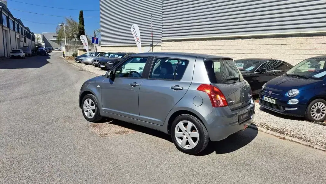 Suzuki Swift 2008 - 6480 EUR, 165747 km - 165747km - foto 19 de 39