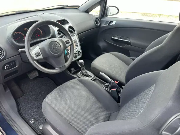 Opel Corsa 2013 - 8490 EUR, 110000 km - AUTO.MOTO.pt - 110000km - foto 9 de 16