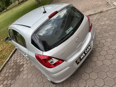 Opel Corsa 2013 - 7465 EUR, 99000 km - AUTO.MOTO.pt - 99000km - foto 11 de 41