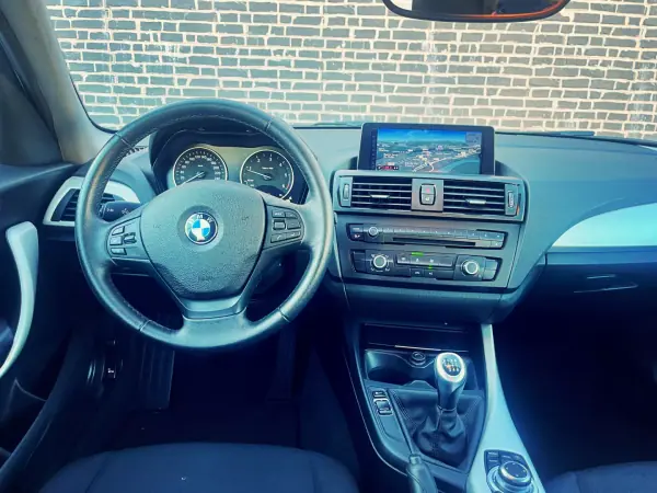 BMW 116 2013 - 15900 EUR, 118000 km - AUTO.MOTO.pt - 118000km - foto 11 de 13