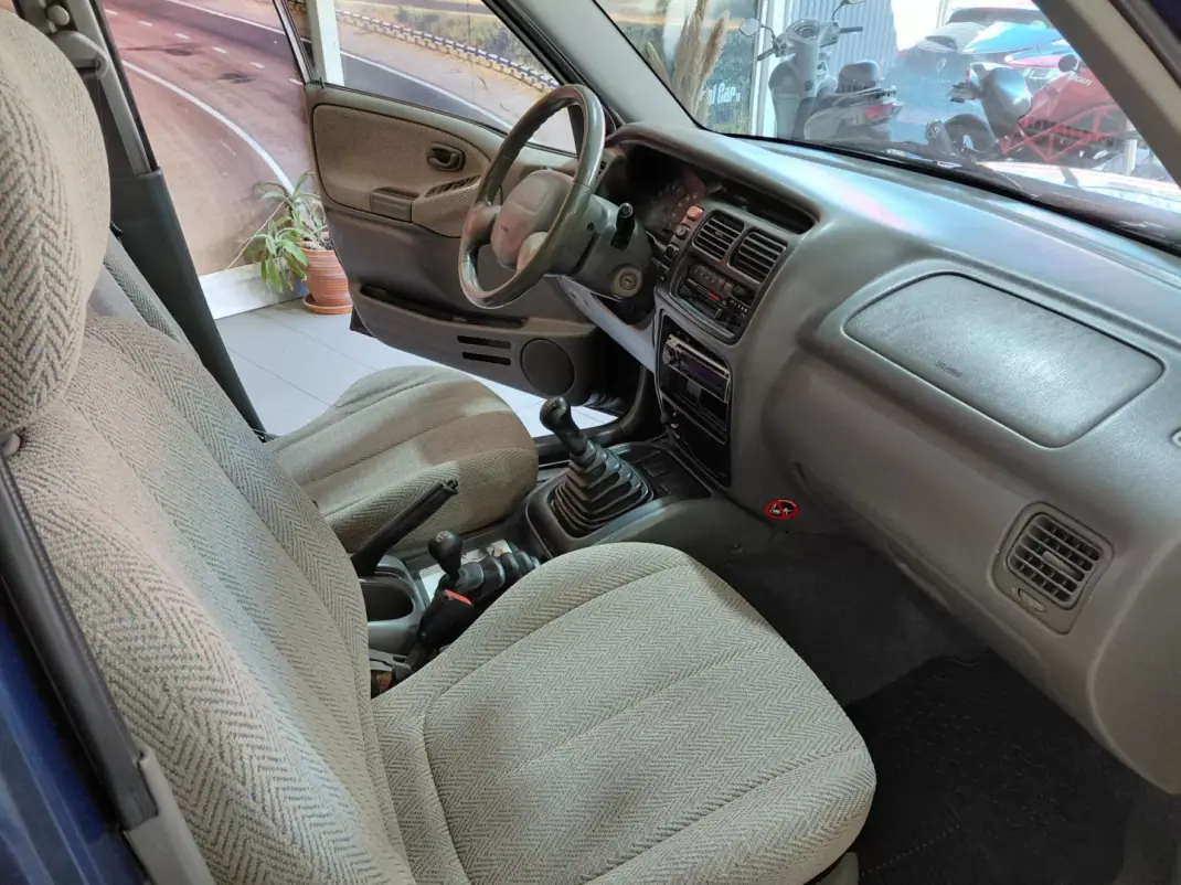 Suzuki Grand Vitara 1999 - 5900 EUR, 285000 km - AUTO.MOTO.pt - 285000km - foto 15 de 15
