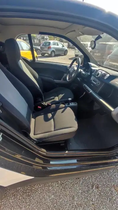 Smart Fortwo Cabrio 2013 - 8279 EUR, 110056 km - AUTO.MOTO.pt - 110056km - foto 7 de 19