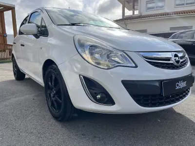 Opel Corsa 2011 - 6450 EUR, 117000 km - AUTO.MOTO.pt - 117000km - foto 39 de 50