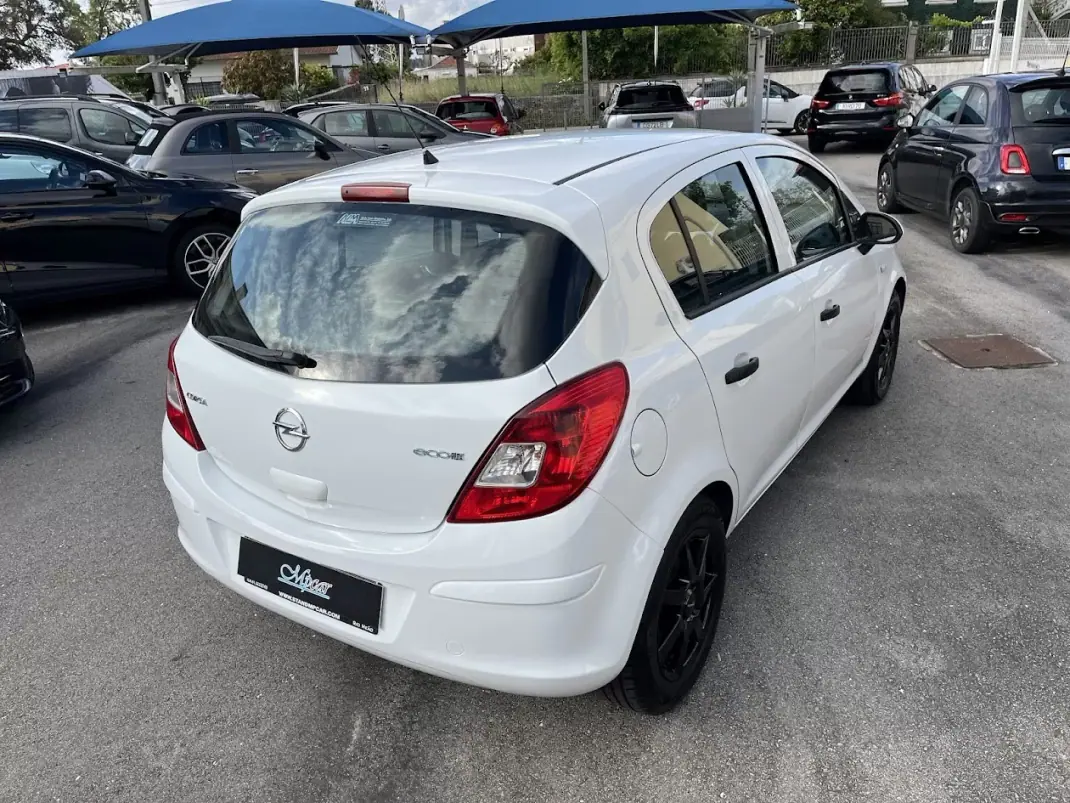 Opel Corsa 2011 - 6450 EUR, 117000 km - AUTO.MOTO.pt - 117000km - foto 44 de 50