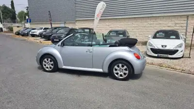 Volkswagen New Beetle Cabriolet 2004 - 9890 EUR, 127830 km - AUTO.MOTO.pt - 127830km - foto 31 de 48