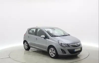 Opel Corsa 2013 - 7990 EUR, 118654 km - AUTO.MOTO.pt - 118654km - foto 4 de 14