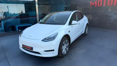 Tesla Model Y 2024 - 38500 EUR, 57000 km - 57000km - foto 5 de 9