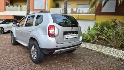 Dacia Duster 2015 - 12480 EUR, 105000 km - AUTO.MOTO.pt - 105000km - foto 14 de 16