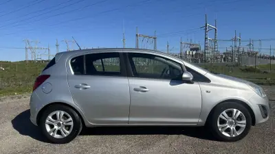 Opel Corsa 2013 - 4650 EUR, 212000 km - AUTO.MOTO.pt - 212000km - foto 3 de 13