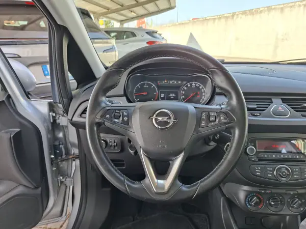 Opel Corsa 2016 - 8750 EUR, 236000 km - AUTO.MOTO.pt - 236000km - foto 17 de 26
