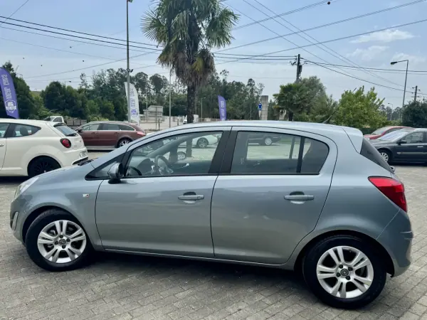 Opel Corsa 2011 - 6950 EUR, 212000 km - AUTO.MOTO.pt - 212000km - foto 7 de 19