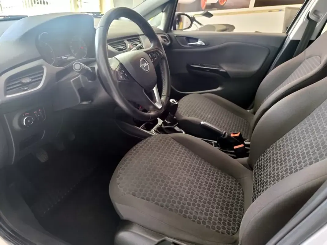 Opel Corsa 2018 - 10980 EUR, 118000 km - AUTO.MOTO.pt - 118000km - foto 4 de 23