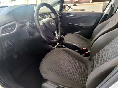 Opel Corsa 2018 - 10980 EUR, 118000 km - AUTO.MOTO.pt - 118000km - foto 4 de 23