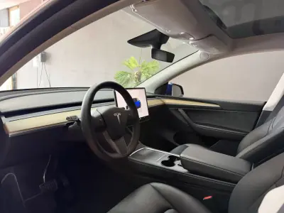 Tesla Model Y 2022 - 37990 EUR, 52574 km - AUTO.MOTO.pt - 52574km - foto 7 de 15