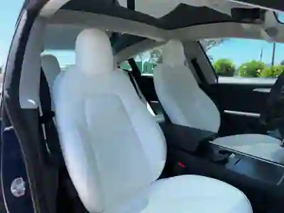Tesla Model 3 2023 - 34990 EUR, 69960 km - AUTO.MOTO.pt - 69960km - foto 5 de 8