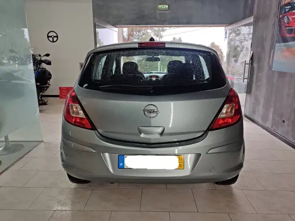 Opel Corsa 2013 - 7990 EUR, 118654 km - AUTO.MOTO.pt - 118654km - foto 3 de 14