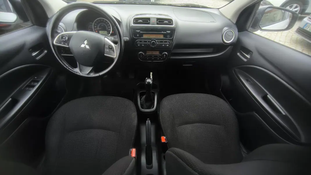 Mitsubishi Space Star 2014 - 7750 EUR, 125476 km - AUTO.MOTO.pt - 125476km - foto 6 de 7