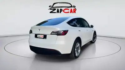 Tesla Model Y 2023 - 31900 EUR, 42638 km - AUTO.MOTO.pt - 42638km - foto 4 de 11