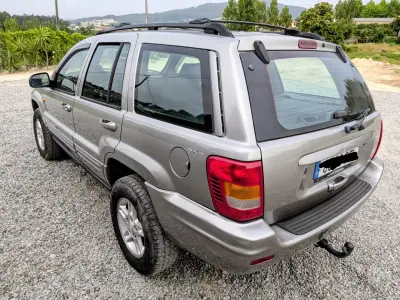 Jeep Grand Cherokee 1999 - 9500 EUR, 300000 km - AUTO.MOTO.pt - 300000km - foto 7 de 14