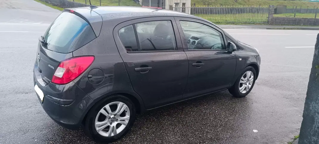 Opel Corsa 2013 - 6500 EUR, 193000 km - AUTO.MOTO.pt - 193000km - foto 7 de 16