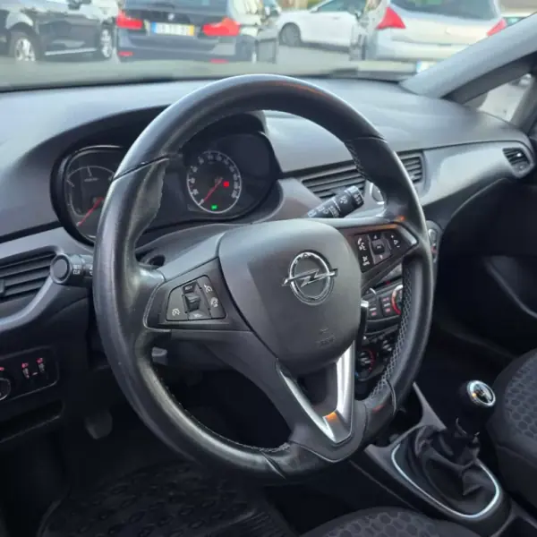 Opel Corsa 2017 - 9750 EUR, 130248 km - AUTO.MOTO.pt - 130248km - foto 10 de 19