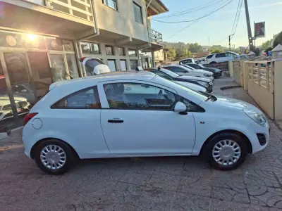 Opel Corsa 2012 — foto 5 de 19