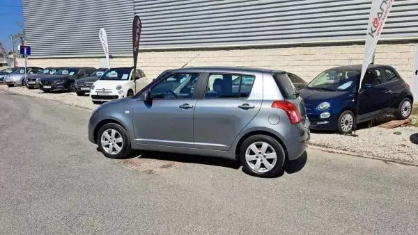 Suzuki Swift 2008 - 6480 EUR, 165747 km - AUTO.MOTO.pt - 165747km - foto 21 de 39